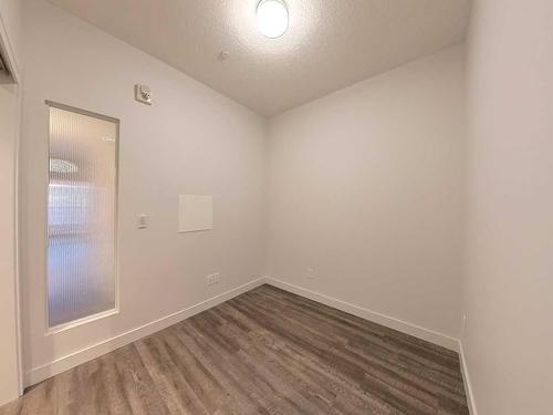 203-730 5 Street Ne, Calgary, AB - Indoor Photo Showing Other Room