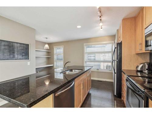 333 Aspen Hills Villas Sw, Calgary, AB - Indoor Photo Showing Kitchen With Stainless Steel Kitchen With Double Sink With Upgraded Kitchen