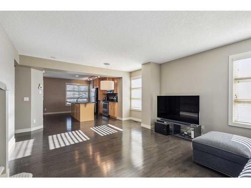 333 Aspen Hills Villas Sw, Calgary, AB - Indoor Photo Showing Living Room