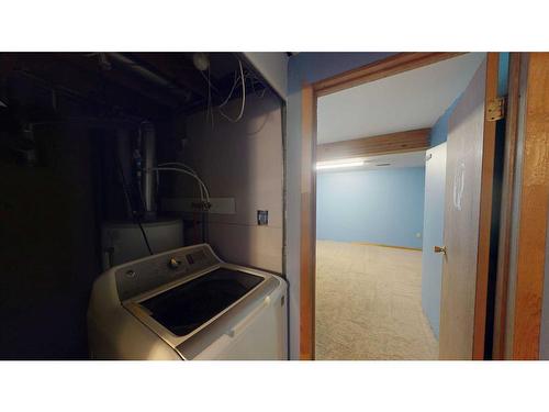 42-2519 38 Street Ne, Calgary, AB - Indoor Photo Showing Laundry Room