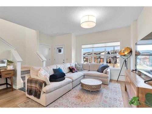 109-525 River Heights Drive, Cochrane, AB - Indoor Photo Showing Living Room