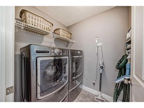 37 Everhollow Park Sw, Calgary, AB - Indoor Photo Showing Laundry Room