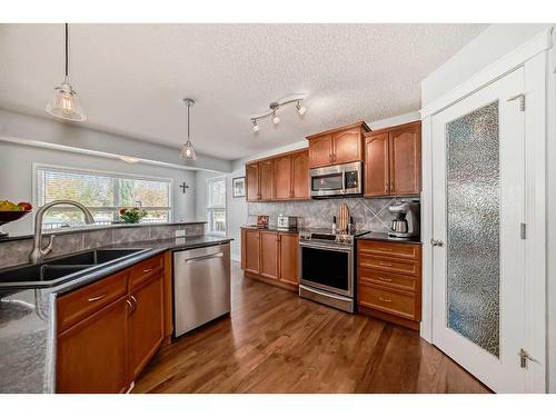 37 Everhollow Park Sw, Calgary, AB - Indoor Photo Showing Kitchen With Double Sink