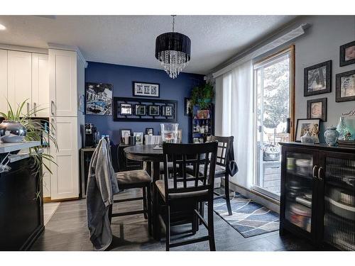 15 Glenpatrick Crescent, Cochrane, AB - Indoor Photo Showing Dining Room