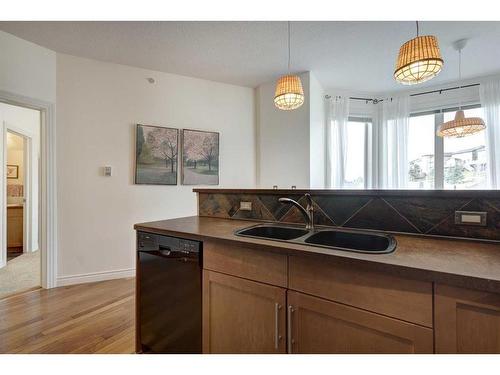 532-26 Val Gardena View Sw, Calgary, AB - Indoor Photo Showing Kitchen With Double Sink