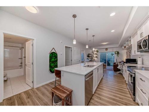 104-200 Harvest Hills Place Ne, Calgary, AB - Indoor Photo Showing Kitchen With Upgraded Kitchen