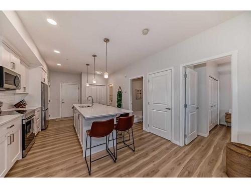 104-200 Harvest Hills Place Ne, Calgary, AB - Indoor Photo Showing Kitchen With Upgraded Kitchen