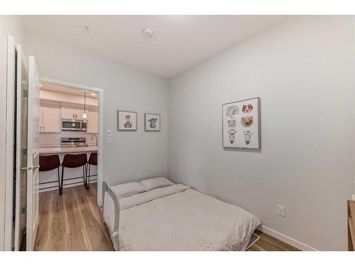 104-200 Harvest Hills Place Ne, Calgary, AB - Indoor Photo Showing Bedroom