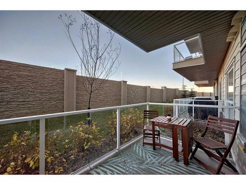 104-200 Harvest Hills Place Ne, Calgary, AB - Outdoor With Balcony With Exterior