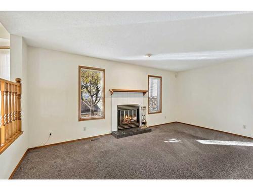 2858 Catalina Boulevard Ne, Calgary, AB - Indoor With Fireplace