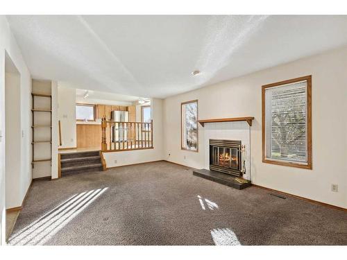 2858 Catalina Boulevard Ne, Calgary, AB - Indoor With Fireplace