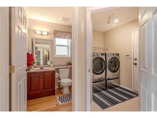 51 Arbour Butte Way Nw, Calgary, AB - Indoor Photo Showing Laundry Room