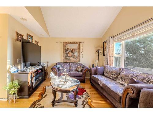 51 Arbour Butte Way Nw, Calgary, AB - Indoor Photo Showing Living Room