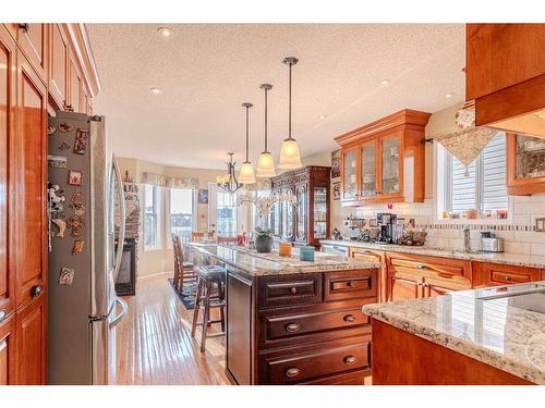 51 Arbour Butte Way Nw, Calgary, AB - Indoor Photo Showing Kitchen With Upgraded Kitchen