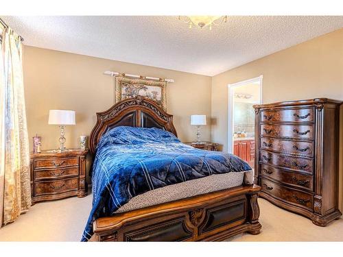 51 Arbour Butte Way Nw, Calgary, AB - Indoor Photo Showing Bedroom