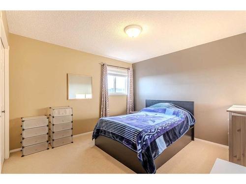 51 Arbour Butte Way Nw, Calgary, AB - Indoor Photo Showing Bedroom