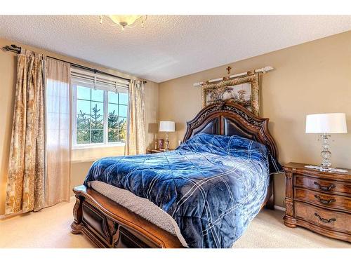 51 Arbour Butte Way Nw, Calgary, AB - Indoor Photo Showing Bedroom