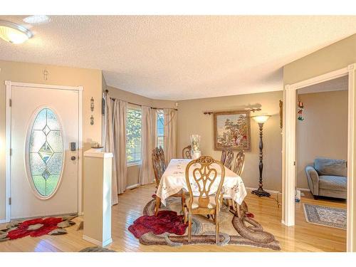 51 Arbour Butte Way Nw, Calgary, AB - Indoor Photo Showing Dining Room