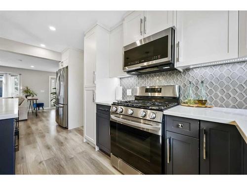 7128 Hunterwood Road Nw, Calgary, AB - Indoor Photo Showing Kitchen