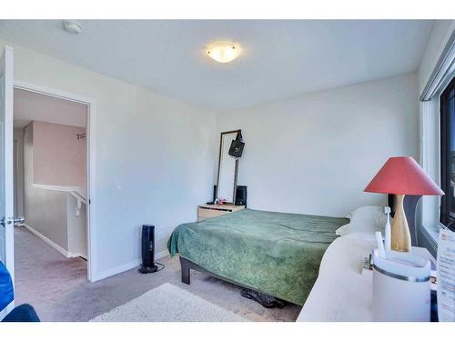 209 Windford Park Sw, Airdrie, AB - Indoor Photo Showing Bedroom