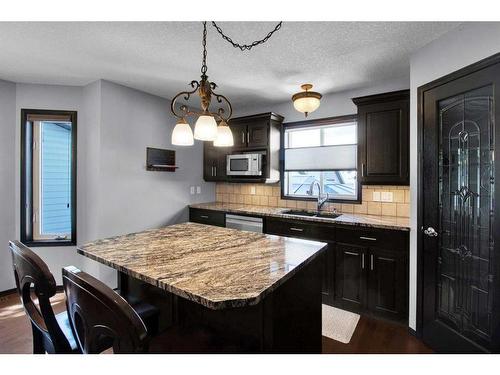 228 Sheep River Lane, Okotoks, AB - Indoor Photo Showing Kitchen