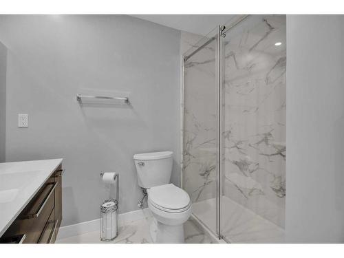 228 Sheep River Lane, Okotoks, AB - Indoor Photo Showing Bathroom