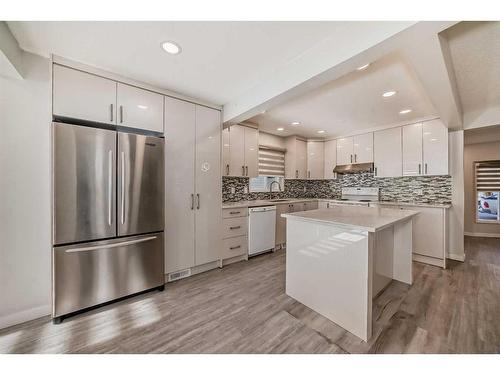 1131 Millcrest Rise Sw, Calgary, AB - Indoor Photo Showing Kitchen With Upgraded Kitchen