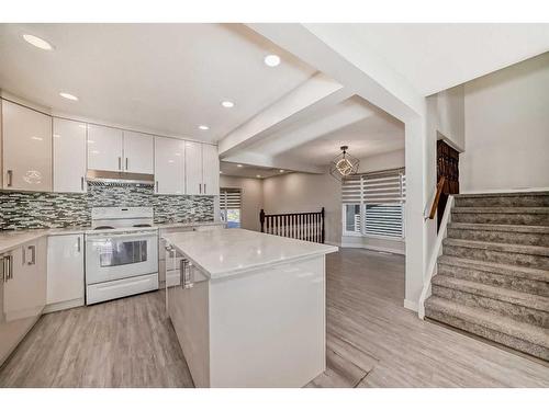 1131 Millcrest Rise Sw, Calgary, AB - Indoor Photo Showing Kitchen With Upgraded Kitchen