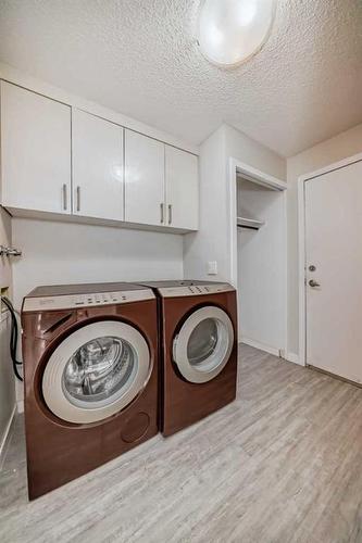 1131 Millcrest Rise Sw, Calgary, AB - Indoor Photo Showing Laundry Room