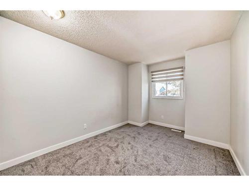 1131 Millcrest Rise Sw, Calgary, AB - Indoor Photo Showing Other Room