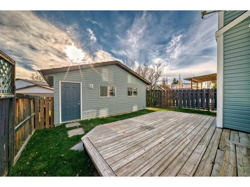 1131 Millcrest Rise Sw, Calgary, AB - Outdoor With Deck Patio Veranda With Exterior