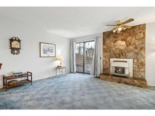 280 Midpark Gardens Se, Calgary, AB - Indoor With Fireplace