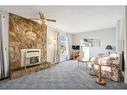 280 Midpark Gardens Se, Calgary, AB  - Indoor Photo Showing Living Room With Fireplace 