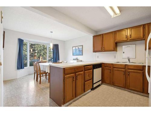 280 Midpark Gardens Se, Calgary, AB - Indoor Photo Showing Kitchen With Double Sink