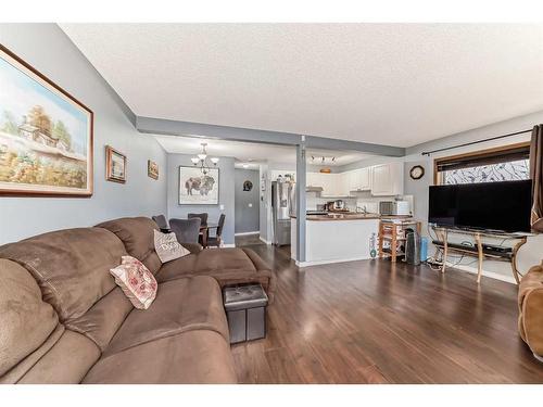 131 Millview Square Sw, Calgary, AB - Indoor Photo Showing Living Room