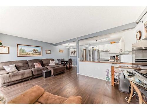 131 Millview Square Sw, Calgary, AB - Indoor Photo Showing Living Room