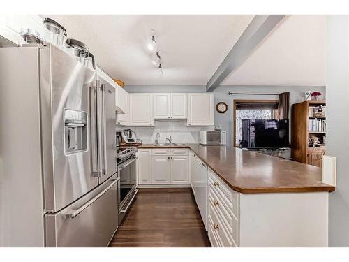 131 Millview Square Sw, Calgary, AB - Indoor Photo Showing Kitchen With Double Sink