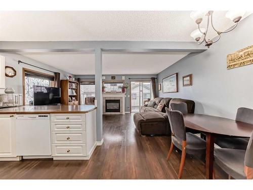 131 Millview Square Sw, Calgary, AB - Indoor With Fireplace