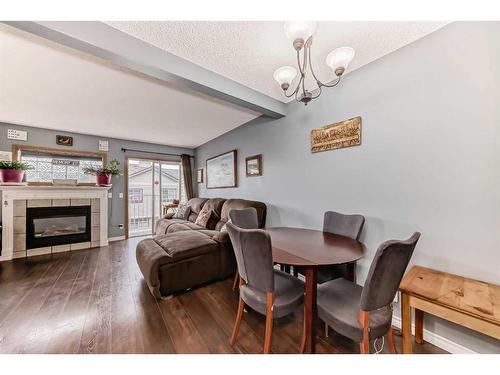 131 Millview Square Sw, Calgary, AB - Indoor With Fireplace