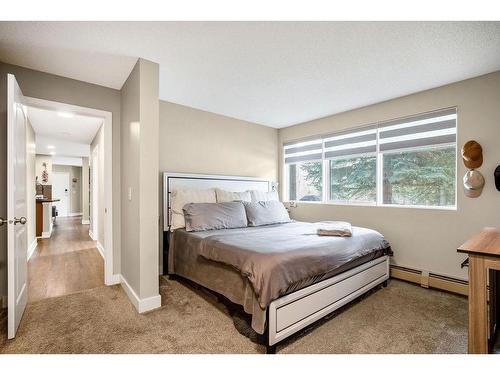 1-105 Village Heights Sw, Calgary, AB - Indoor Photo Showing Bedroom