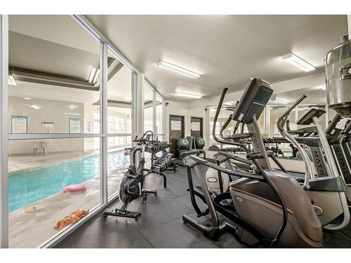 1-105 Village Heights Sw, Calgary, AB - Indoor Photo Showing Gym Room