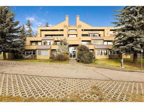 1-105 Village Heights Sw, Calgary, AB - Outdoor With Facade