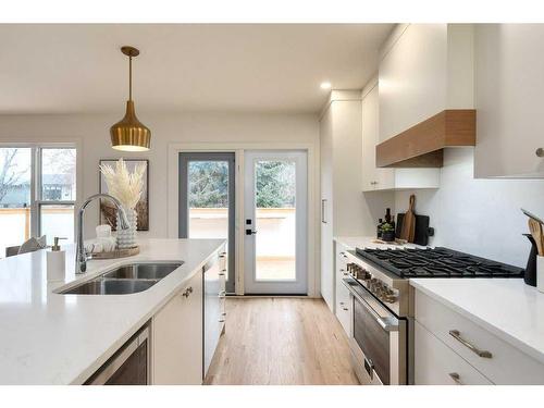 4711 29 Avenue Sw, Calgary, AB - Indoor Photo Showing Kitchen With Double Sink With Upgraded Kitchen