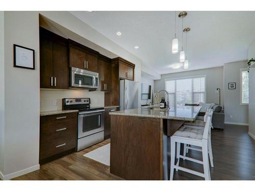 173 New Brighton Walk Se, Calgary, AB - Indoor Photo Showing Kitchen With Stainless Steel Kitchen With Upgraded Kitchen