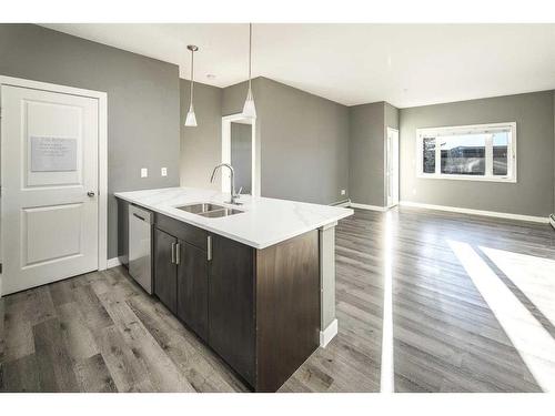 229-23 Millrise Drive Sw, Calgary, AB - Indoor Photo Showing Kitchen With Double Sink