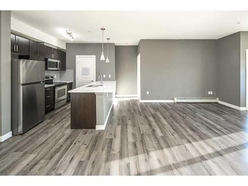 229-23 Millrise Drive Sw, Calgary, AB - Indoor Photo Showing Kitchen With Upgraded Kitchen