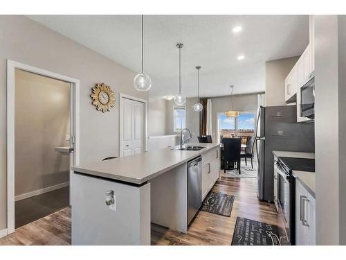 64 Copperstone Common Se, Calgary, AB - Indoor Photo Showing Kitchen With Double Sink With Upgraded Kitchen