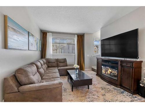 64 Copperstone Common Se, Calgary, AB - Indoor Photo Showing Living Room