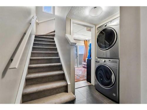 64 Copperstone Common Se, Calgary, AB - Indoor Photo Showing Laundry Room