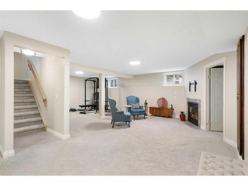 8 Shawnee Way Sw, Calgary, AB - Indoor Photo Showing Basement